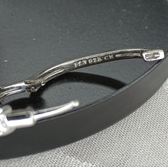 3.48CTW Rhodium Plated Diamond Simulant Hoop Earrings - Picture 7 of 7